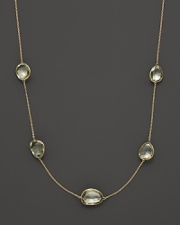 Five stations of faceted green amethyst gleam in 14K. yellow gold settings.