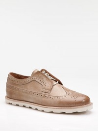 A more casual, easy-wearing fit for the classic wingtip, complete with perforated trim and Goodyear welt soles for added ventilation, strength and comfort. Leather Leather lining Padded insole Goodyear welt rubber sole Imported 