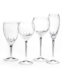 Inspired by the chic London neighborhood, Wedgwood Knightsbridge stemware features a delicately round shape with deep cuts around the bowl. The stem resembles a flower when viewed from above. Flute shown far right.