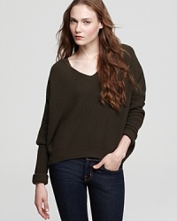 A boxy silhouette lends a relaxed fit and feel to this casual-chic sweater, rendered from a very soft wool blend.