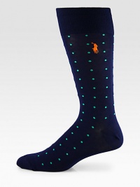 A dynamic dot-print pattern in a bold hue woven in soft, breathable stretch cotton.Mid-calf height57% cotton/37% nylon/3% rubber/2% spandex/1% other fibersMachine washImported