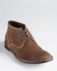 Trimmed with contrast stitching accents, these stylish Chukka boots keep you one step ahead of the trend.