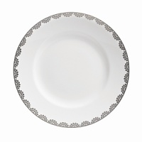 Vera Wang introduces Flirt fine bone china dinnerware. This platinum banded pattern features a modern scallop lace motif and a contemporary take on traditional lace work. Decoration on the inner verge of the accent plate, bread and butter and tea saucer adds a flirtatious touch of whimsy.