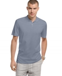 The soft, silky feel of this polo shirt from Calvin Klein adds a luxurious detail to the classic shirt. (Clearance)