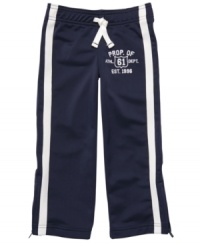 Perfect for your future track and field star. He'll make long strides in the athletic department with these comfy track pants by Carter's.