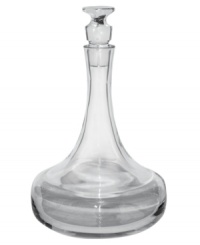 Nambe's new Groove. This brilliant, solid crystal decanter refracts light and stays put on a heavy base built for stability while a grooved stopper echoes the shape of coordinating drinkware. Bold, masculine and perfectly at home in modern decor.