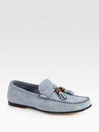 Soft suede moccasin with bamboo tassel detail.Leather soleMade in Italy