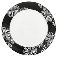 First at Bloomingdale's. These bold black and white patterns are made to mix and match. Choose five-piece place settings in floral Dogwood Point, banded Nag's Head or striped Pinney's Beach. Dogwood Point shown here.