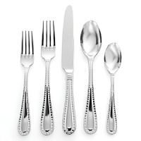 Positively riveting, this rivet-bordered flatware from Ricci Argentieri is elegant and refined.