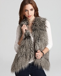 A timeless fashion piece for winter layering, this glamorous faux fur GUESS vest offers equal parts glamour and versatility for cozy-chic.