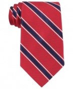 The perfect prep. Knot up in this sophisticated striped tie from Tommy Hilfiger.