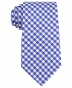 A necktie guaranteed to cheer up even the most staid suit, in bright gingham silk from Tommy Hilfiger.