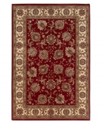 Inspired by classic Persian art and culture, this rug features an arresting color palette of burnt red and neutral hues and a beautiful, curvilinear floral pattern. Easy-care polypropylene ensures durability.