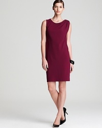 With impeccable tailoring and a jewel tone palette, this DNKY dress stops traffic from commute to corner office.