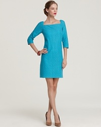 Delicate lace and demure three-quarter sleeves set the feminine tone for this chic Trina Turk shift dress.