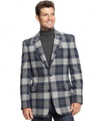 Step out in polished plaid for for standout night-on-the-town style with this handsome Tommy Hilfiger sport coat.