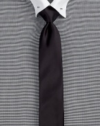 An elegant rendition of a simple necktie, rendered in a luxurious stretch cotton blend.About 2½ wide59% cotton/37% polyester/4% elastaneDry cleanMade in Italy