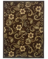 An organic swirl of florals are captured in deep, natural tones -- woodland browns and mossy greens -- on this dramatic area rug from Sphinx. Made from polypropylene for superb, stain-resistant durability, it's the ideal design for high-traffic areas.