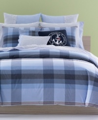 Set sail with Tommy! The Heritage duvet cover set makes over your bed in preppy, Tommy Hilfiger style with its yarn-dyed handkerchief plaid finished with red accents. Features pure cotton; button closure. (Clearance)