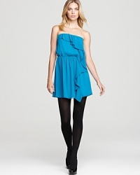 Get the party started in this chic strapless dress with stylish pleats and cascading ruffles down the front.