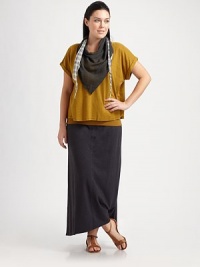 A boxy-yet-feminine fit and sporty, rolled sleeves give this hemp-organic cotton shirt must-have appeal. Wear it with a long skirt or gauzy, wide-leg pants.Round neckShort sleevesPull-on styleBoxy fitAbout 22 from shoulder to hem55% hemp/45% organic cottonMachine washImported