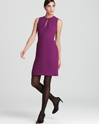 Embrace effortless sophistication in a Rachel Roy sheath dress, finished with a front keyhole for feminine allure. Work the sleeveless silhouette all summer long, then style with a crisp cardigan and opaque tights for cold-weather chic.