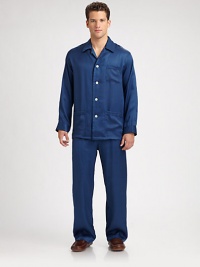 A subtle shadow stripe adds definition and a clean finish to a traditional pajama set, woven from luxurious silk for a fit and feel of superior softness. Silk. Hand wash. Imported.SHIRTButton-frontChest, waist patch pocketsPANTSSide elastic waistbandInseam, about 31