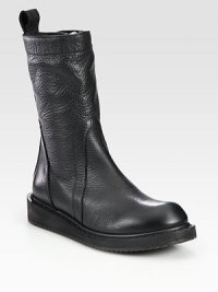 Pebbled leather, mid-calf style with a side zipper, rubber sole and extended pull tab. Rubber wedge, 1 (25mm)Rubber platform, ½ (15mm)Compares to a ½ heel (15mm)Shaft, 10Leg circumference, 12Leather upperSide zipperLeather liningRubber solePadded insoleMade in Italy