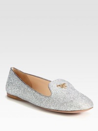 Glitter-coated slipper with metallic leather trim. Glitter fabric upperQuilted leather liningRubber and leather solePadded insoleMade in Italy