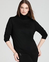 Cozy meets chic as sumptuous wool outfits a sleek Lafayette 148 New York turtleneck.