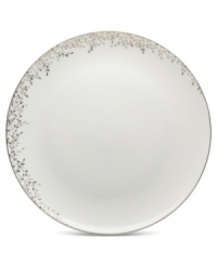 Fringed with shimmering leaves of platinum and mica, these bone china dinner plates from Mikasa turns your table into a springtime utopia. Its sleek coupe shape is a vision of modern elegance in platinum-banded white.