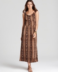 A snakeskin print lends exotic dimension to this VINCE CAMUTO maxi dress. Finish with strappy leather sandals to really work the tribal trend.