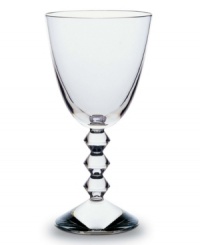 The Vega collection of wine glasses will make a unique and striking addition to your finely set table. Each piece features a neck lined with thick connecting diamond-shaped glass studs leading from the commanding sturdy base to the simple bulb, lending a look that has the timeless effect and appeal of glittering diamonds.