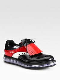 Tri-colored spazzolato leather lace-up with an attached kiltie, enhanced with a transparent cushioned sole for the ultimate experience in comfort and style.Leather upperLeather liningRubber soleMade in Italy