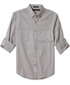 A solid choice. This button-front shirt from Sean John will be your go-to weekend wear.