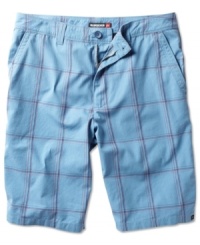 Enjoy the sun while you hit the foamy surf in these breezy, ocean blue plaid shorts from Quiksilver.