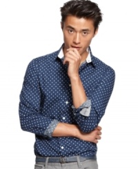 Say goodbye to boring button-downs with this playful dot print shirt by INC International Concepts.