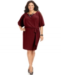 Jessica Simpson's plus size dress is completely flattering with a blouson-style fit, tasseled self-tie belt and flirty split sleeves. (Clearance)