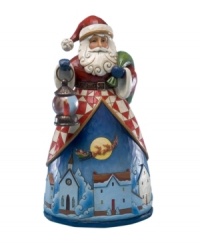 Welcome the festive season with a classic Santa figurine with a unique twist. Jim Shore showcases a scene from Night Before Christmas and combines it with a colorful pattern used in traditional quilt making.