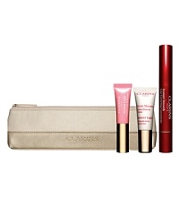 Clarins' trio of instant radiance-makers keeps holiday makeup smooth and glowing at home and when you're on-the-go. Set includes:- Full-Size Instant Smooth Line Correcting Concentrate- Travel-Size Instant Light Lip Perfector- Travel-Size Instant Light Complexion Perfector