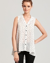 Exude lovely style in this Aqua heart-print blouse, perfect with skinny jeans for evenings out on town with the girls.