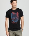 Wild wolves in pop art colors embellish a classic black tee from BOSS Orange.