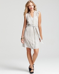 A delicate Swiss dot pattern envelopes this flirty Tory Burch day dress, with pleating accents and pintuck details for trend-right retro flair.