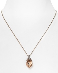 A coolly plated claw grabs for a faceted rose gold stone on this House of Harlow 1960 necklace, finished in a simply styled palladium plated chain.