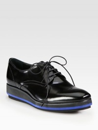 Lace-up oxford design with a micro-platform. Micro-foam wedge, 1½ (40mm)Micro-foam-insert platform, ¾ (20mm)Compares to a ¾ heel (20mm)Leather upperLeather liningRubber solePadded insoleMade in Italy