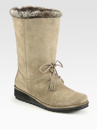 Water-resistant sport suede braves the elements and is enhanced with a faux fur lining for warmth.Shaft, 9Front tie detailFaux fur liningPadded insoleRubber soleMade in SpainAdditional InformationShipping timeline for this item Women's Shoe Size Guide (International Equivalents) This item cannot be shipped via Rush, Next Business Day, Saturday delivery.This item cannot be shipped to a P.O. Box, APO/FPO or U.S. Territory. 