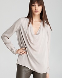 A drapey cowlneck lends elegance to this Vince top, cut from luxurious silk.