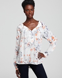 The epitome of country chic, this Rebecca Taylor silk blouse is fresh and polished with your crispest jeans for brunch with the girls.