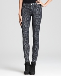 Current/Elliott's skinny jeans flaunt a ladylike lace print--a key trend this season--and cropped length for fashion-forward style.