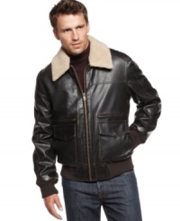 As you go from place to place, dash and take flight with this smooth faux leather aviator bomber.